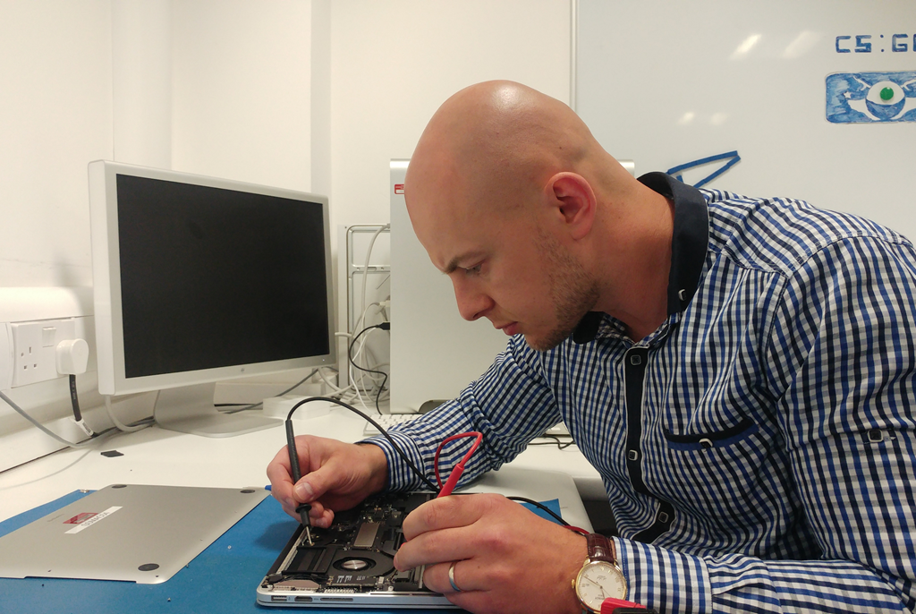 One of our IT Technicians repairing a laptop at the PC Clinic